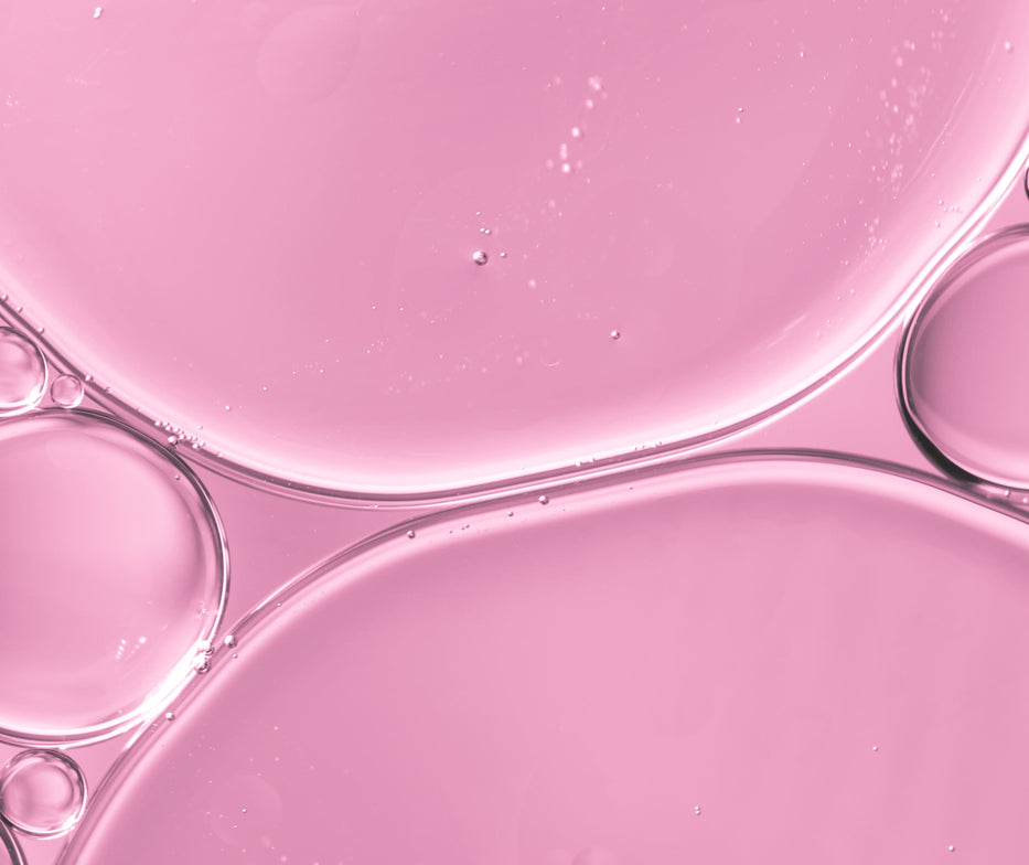 files/translucent-oil-drops-water-soft-pink-blurred-background_1.jpg